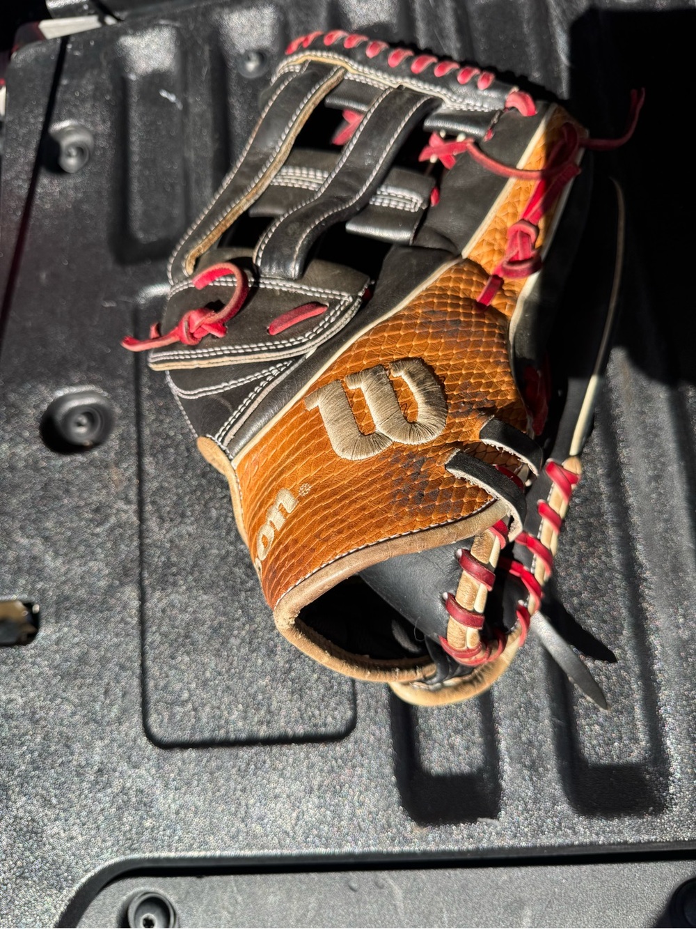 Wilson A2K 1799, 12.75”. Good condition, used one season.